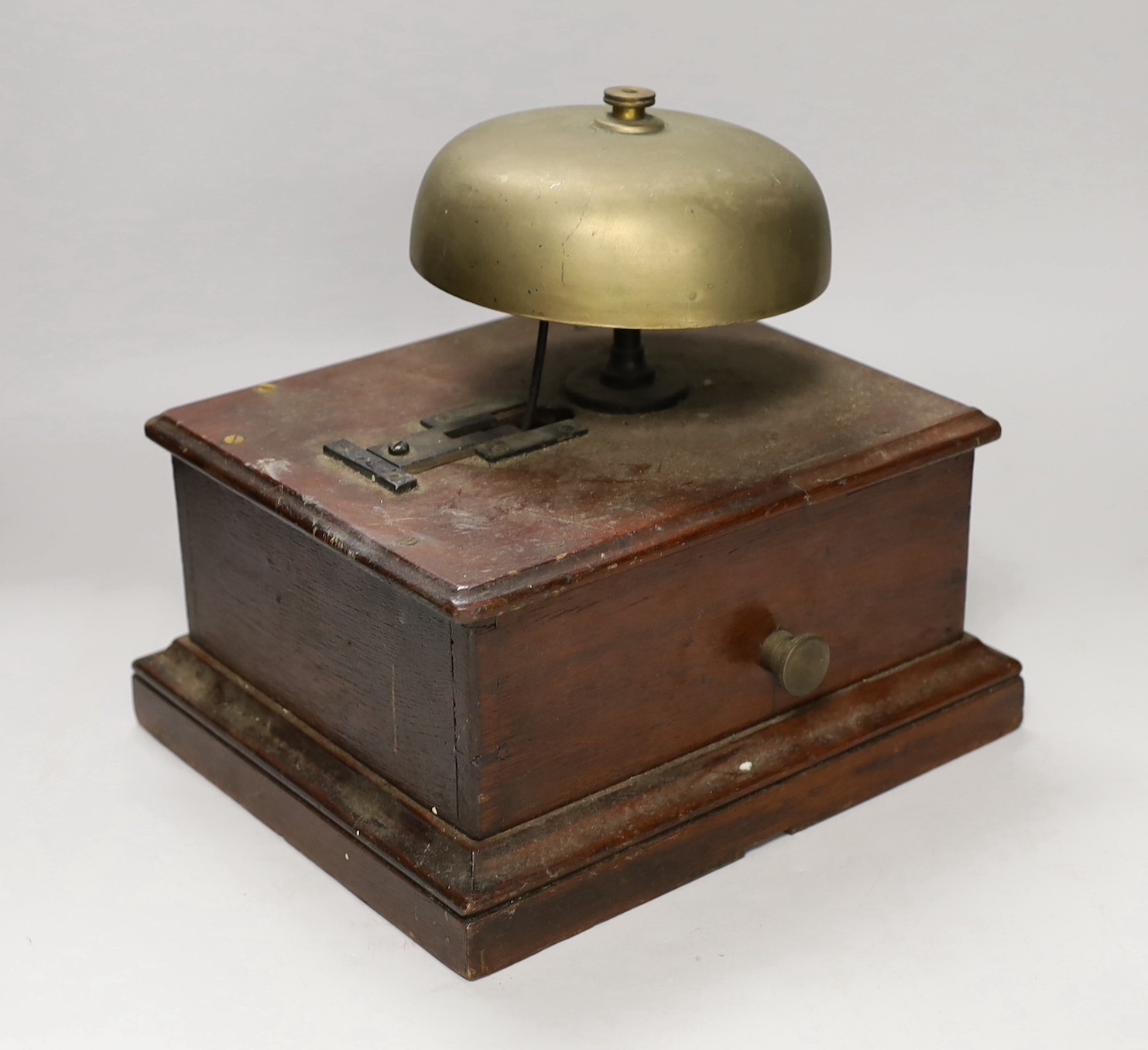 A large mahogany cased block bell, 24cms high